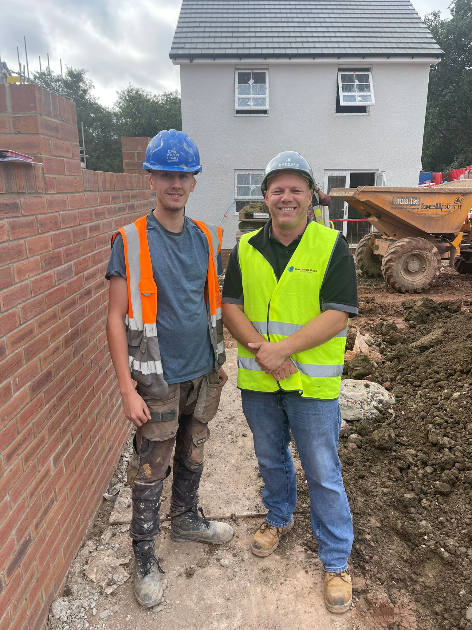 2 men construction picture.